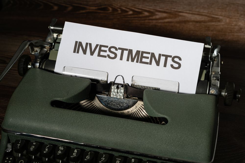 INVESTMENTSと書かれた紙
